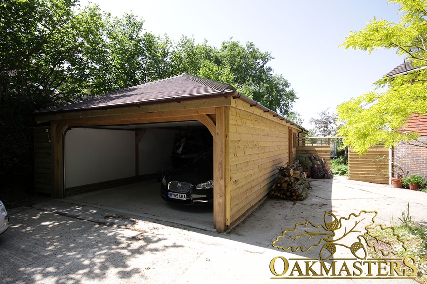 Unusually designed two bay garage and garden room complex