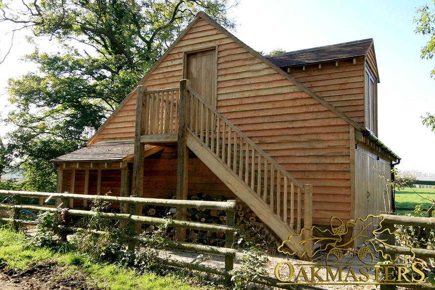 Two bay garage with loft room and external staircase