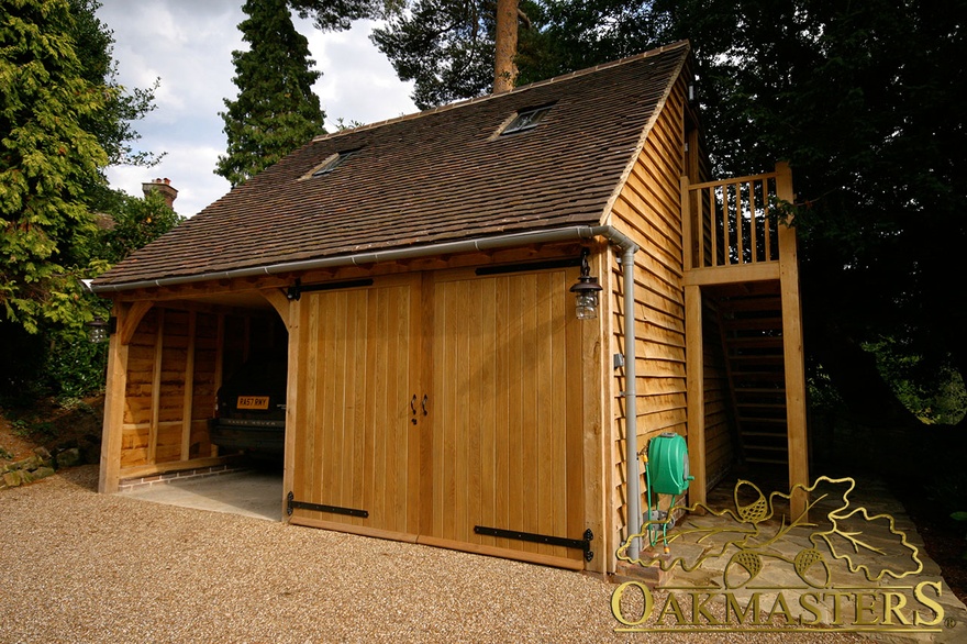 Two bay oak framed  garage with solid oak garage doors