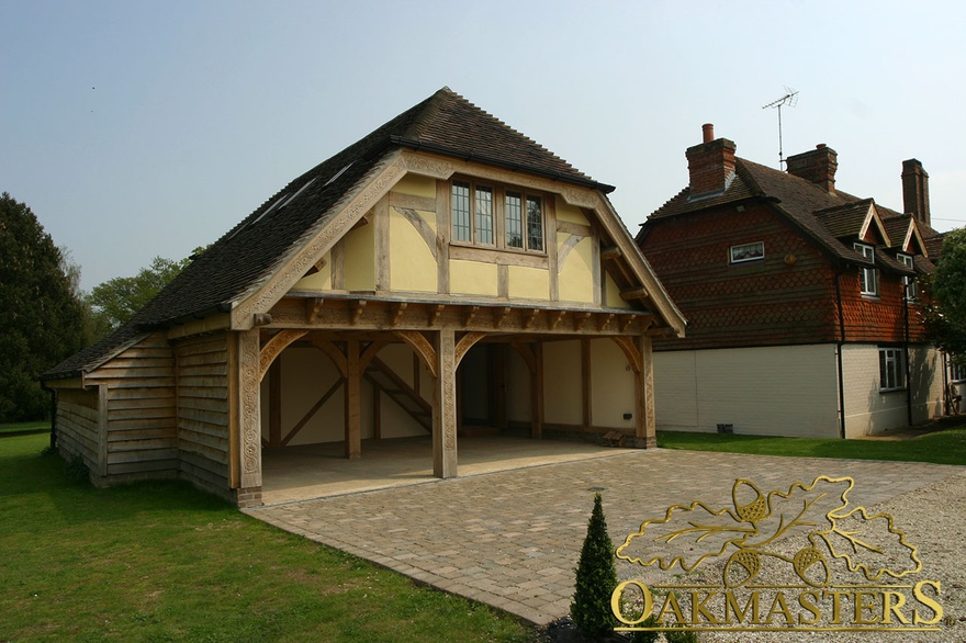 Three bay oak garage with barn hip and loft