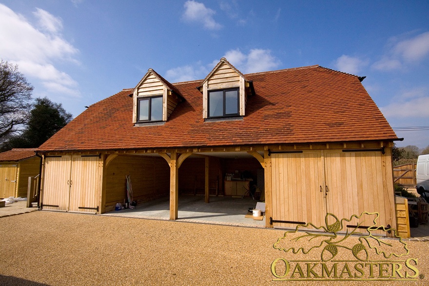 Four bay oak framed garage with loft and dormers