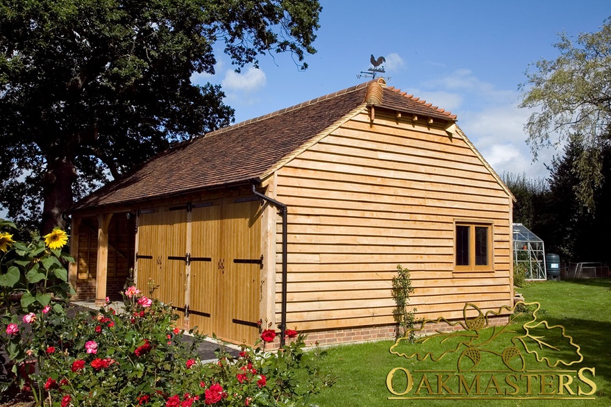 Solid oak featheredge clad oak frame garage