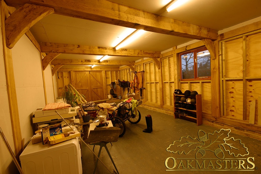 Oak ceiling beams inside a stable complex