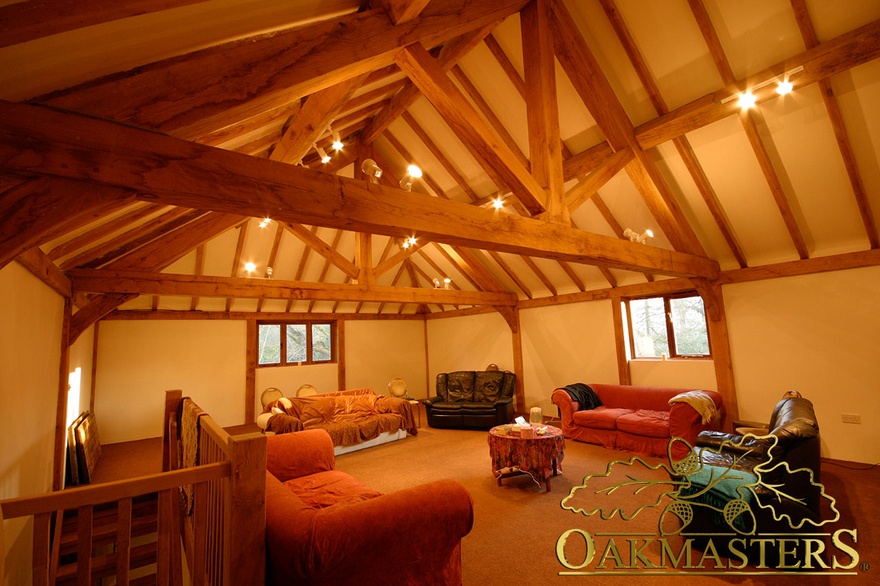 Detail of oak king post trusses in a loft