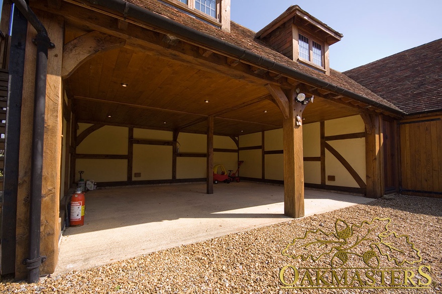 Detail of open oak garage bays