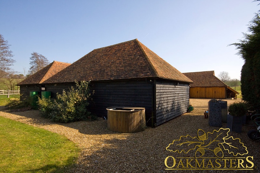 Feather-edge clad oak framed garage complex 