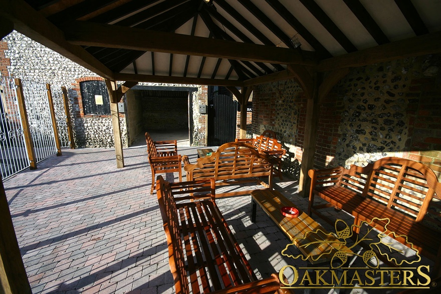 Interior of pub shelter showing exposed beamed roof