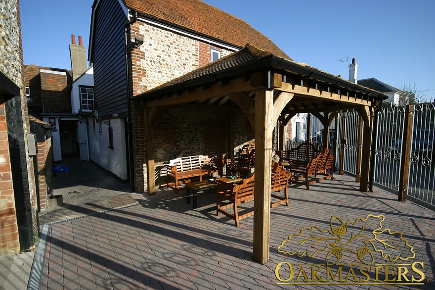 Oak frame pub shelter lean to with exposed braces