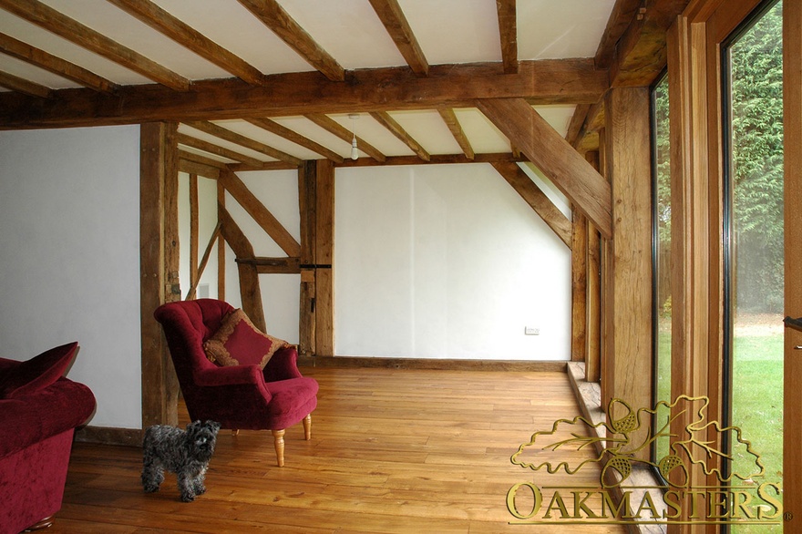 Simple straight oak brackets frame glazed extension