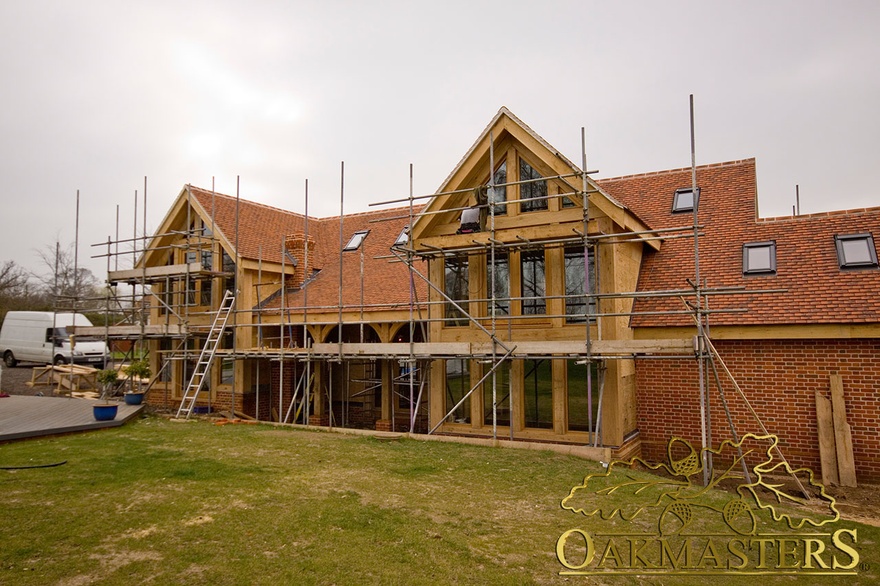 Glazing in progress on large gable extension