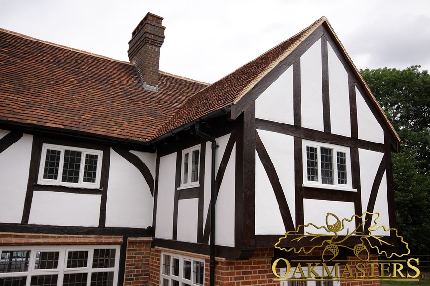 First storey with exposed oak timber frame on listed house extension