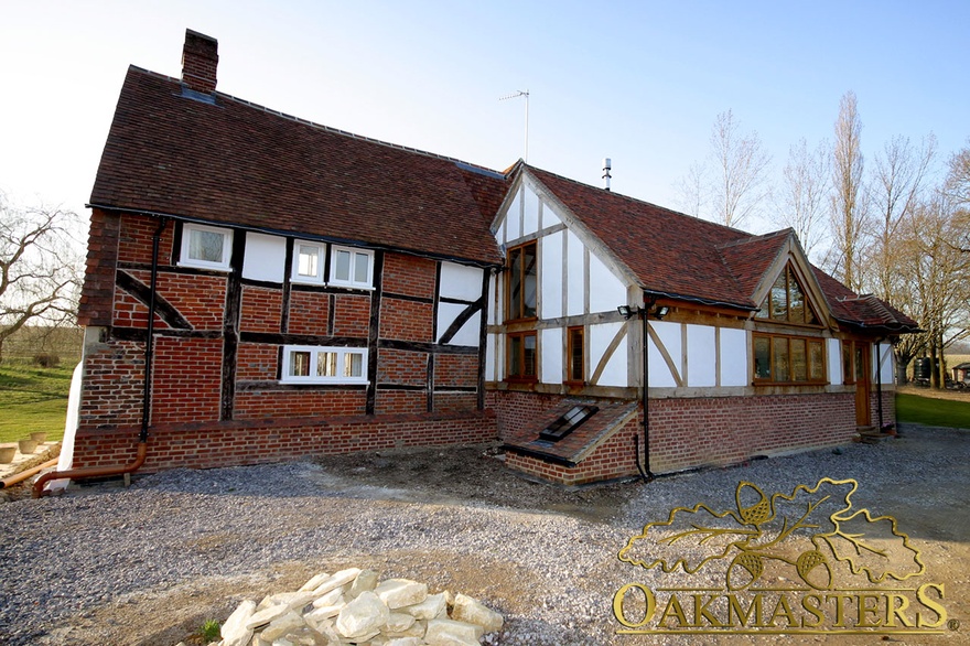 Bespoke oak frame extension integrates perfectly with existing property