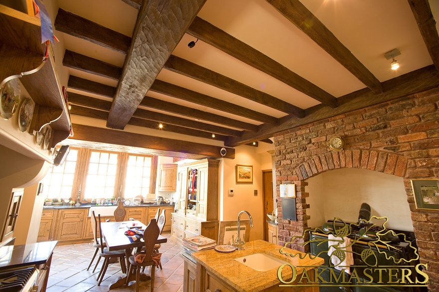 Isle of Man manx oak and stone house kitchen with exposed beams
