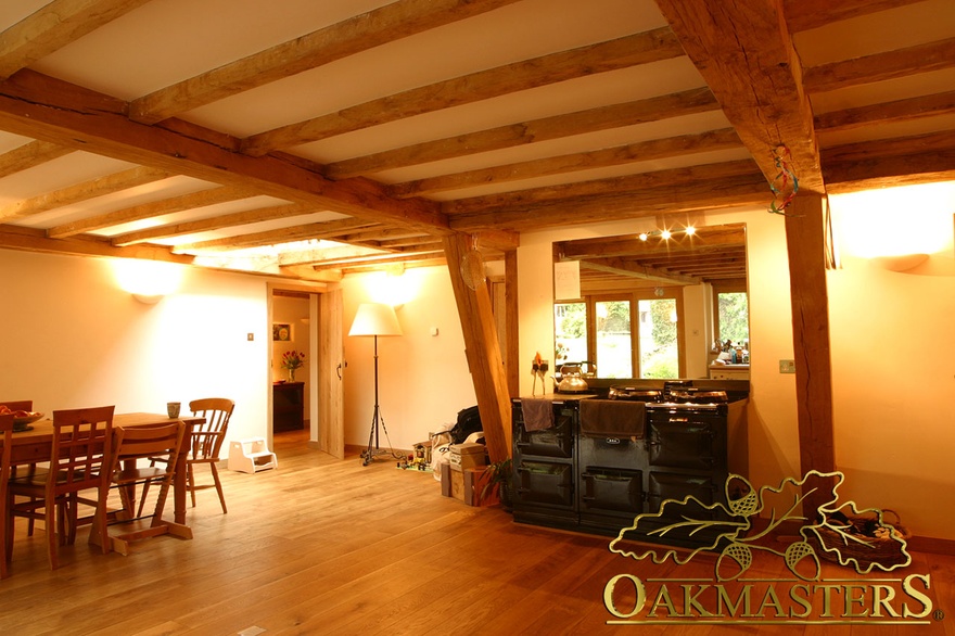 Oak posts frame kitchen aga in country house extension