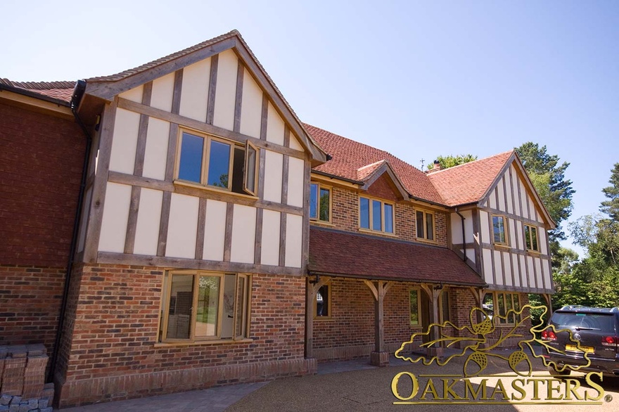 Modern family home with traditional style oak cladding