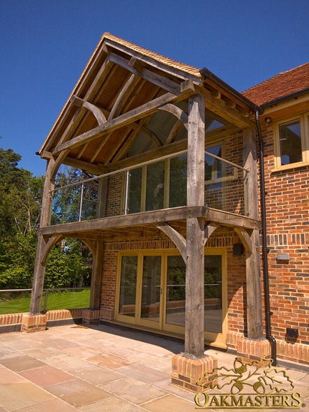 Large oak framed glazed balcony to rear of modern family house