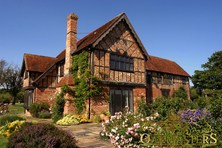 Reclaimed oak residence surrounded by mature garden