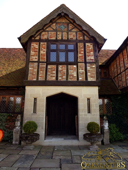 Stone and reclaimed oak clad entrance