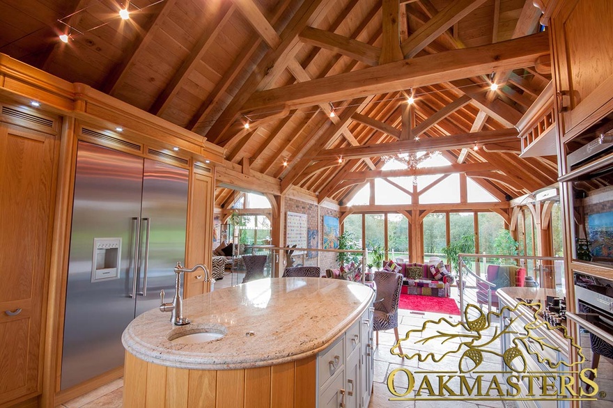 Bespoke hand-crafted oak kitchen with integrated appliances in spacious single storey residence