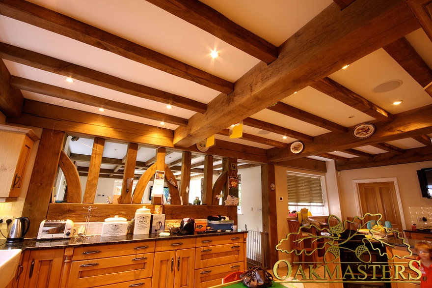 Oak posts complement and support this ceiling layout - 140830
