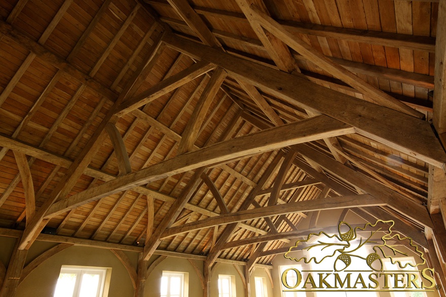 Pool building with exposed wooden roof