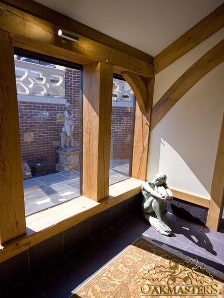Oak frame window detail in poolhouse