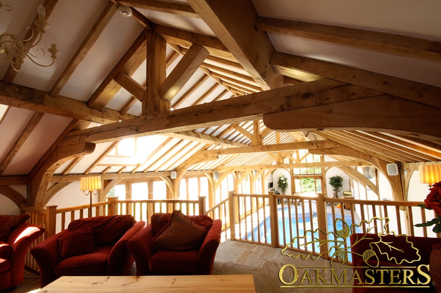 Relaxation area in internal gallery area of vaulted pool house