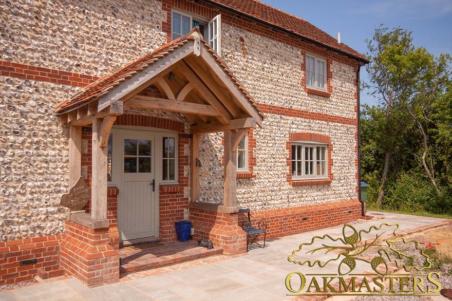 Flint stone house with an oak porch