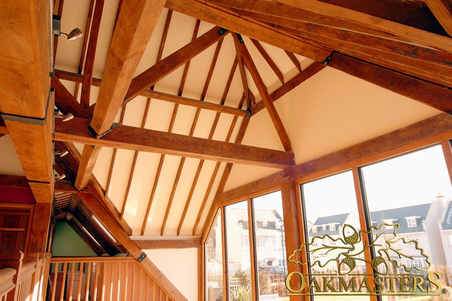 Detail of oak roof apex with exposed rafters