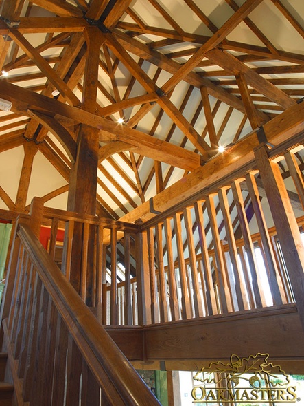 View up the stairs into a stunning vaulted oak roof
