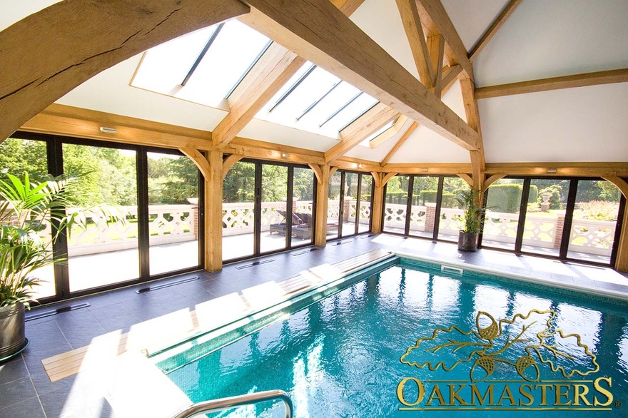 Raised tie truss and skylights in swimming pool ceiling