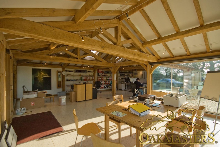 Low pitch roof in office with exposed rafters