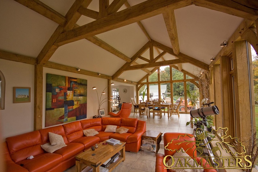 Multiple exposed raised tie trusses in glazed sun room