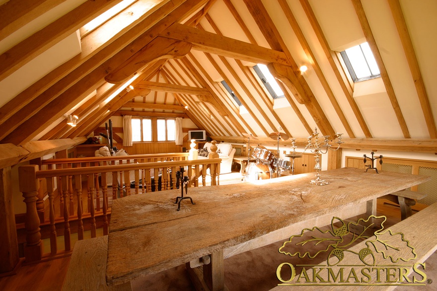 Oak trusses and exposed rafters create unique ambiance in this entertainment loft space