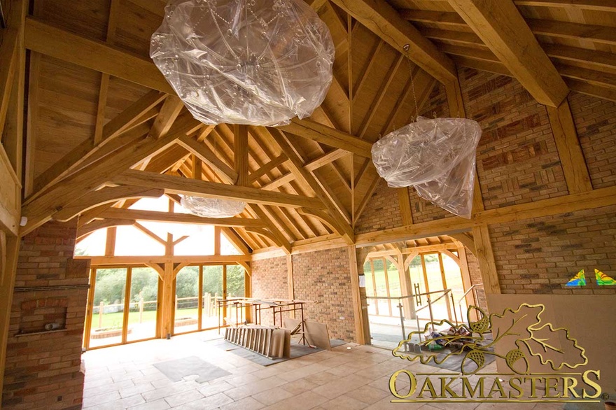 Raised tie trusses in large glazed family sunroom