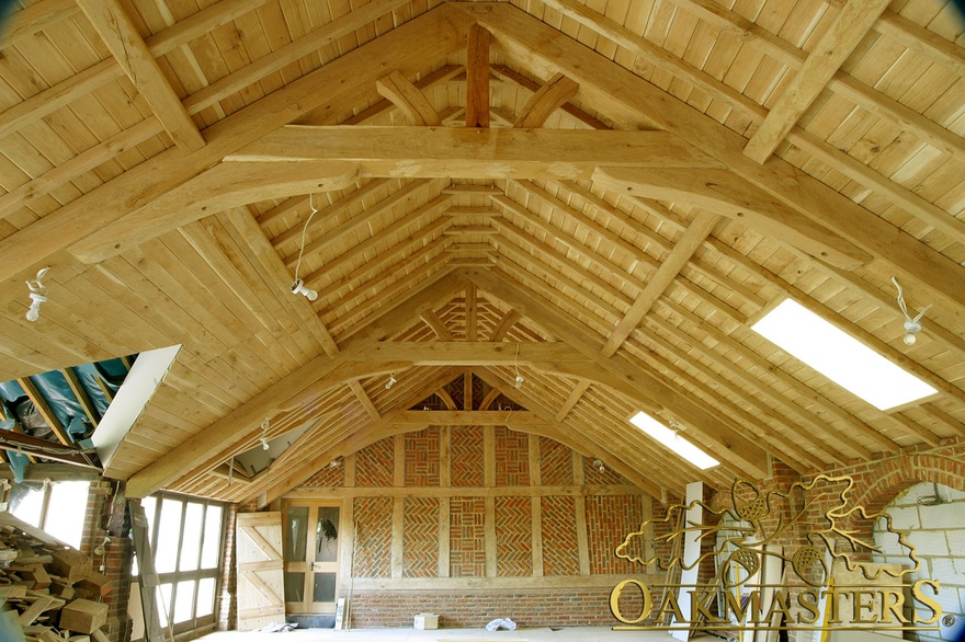Raised tie trusses and timber roof