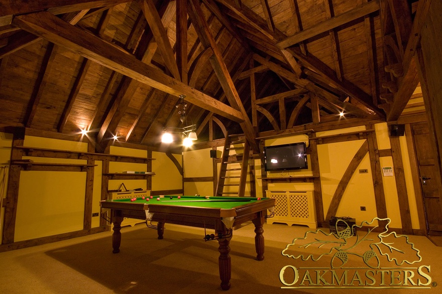 Large king post truss amongst barn style exposed beam features