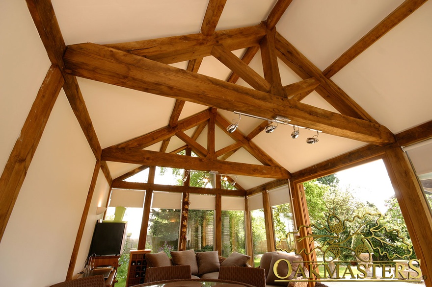 Traditional exposed truss in garden room
