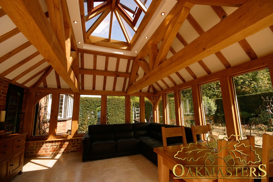 Interior of orangery with glass lantern roof maximising light 