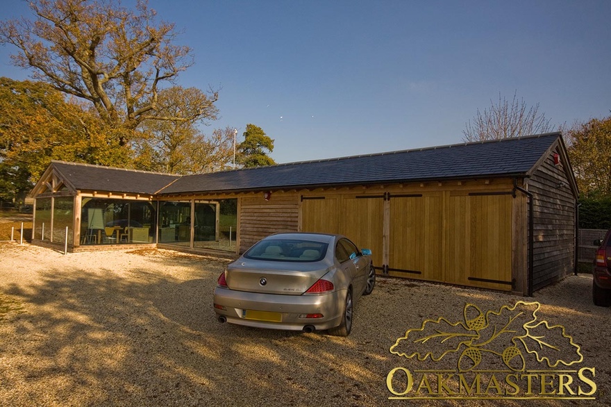 L-shaped glazed garden room office and double bay garage