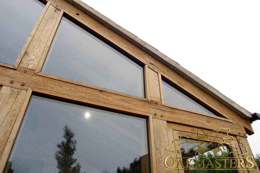 Glazed gable frame detail on oak and stone sunroom