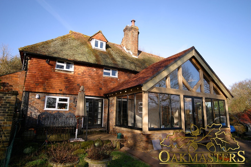 Oak sunroom with modern glazing including glazed gable