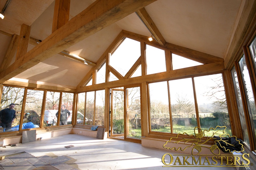 Open aspect sun room with modern glazing before completion