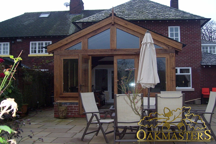 Glazed gable and double glazed doors leading to patio from sun room extension