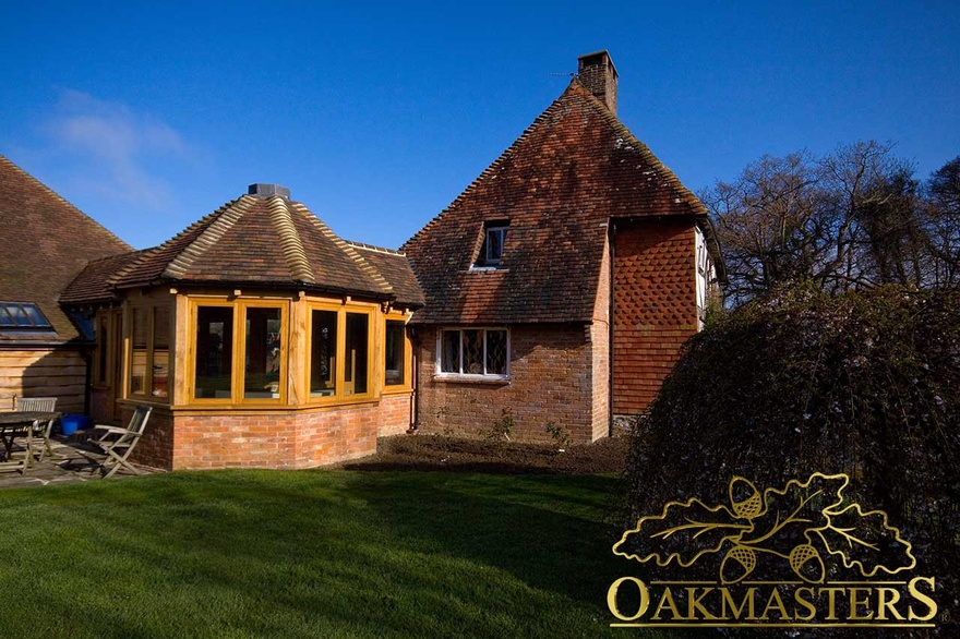 Oak frame glazed windows to unusual link building