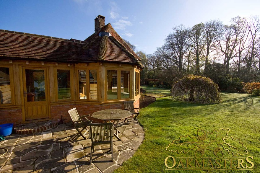 Unusual glazed link building with oak frame windows