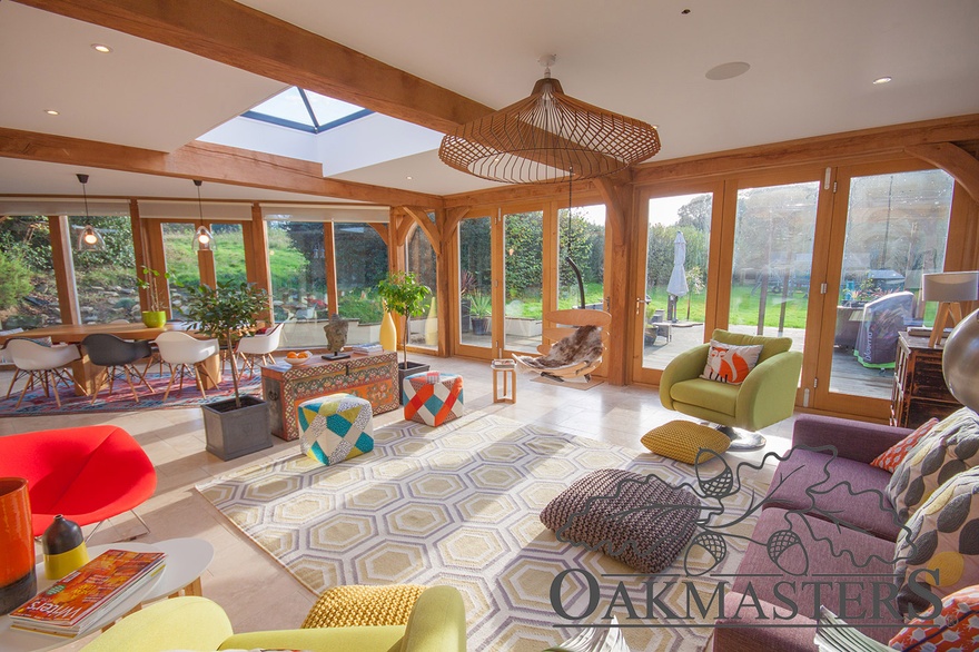 Light pours into this glazed oak framed garden room extension