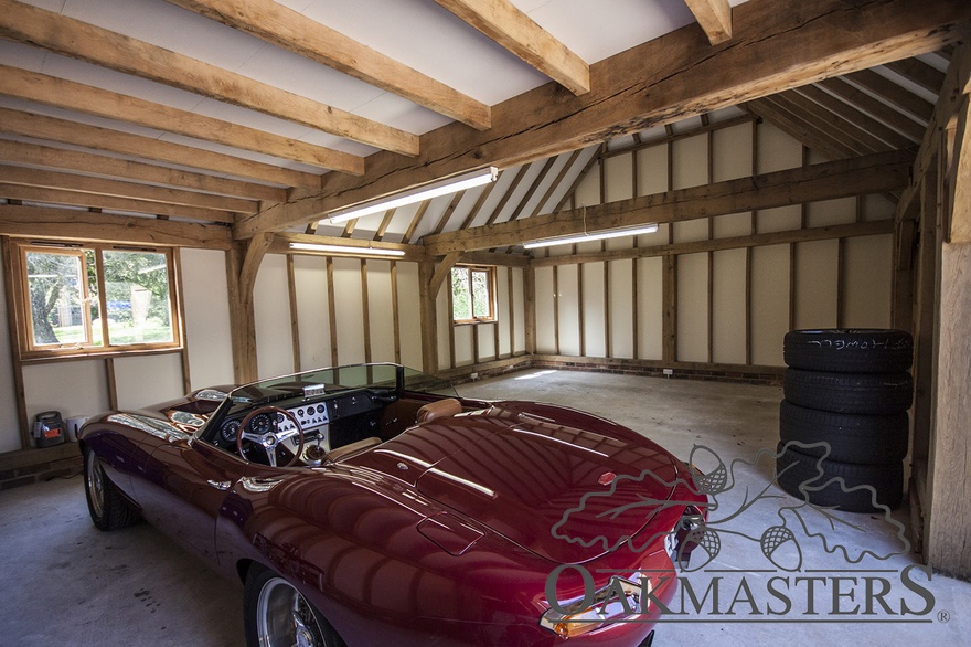 Oak rafters and oak posts detail on the ceiling and walls of the oak garage