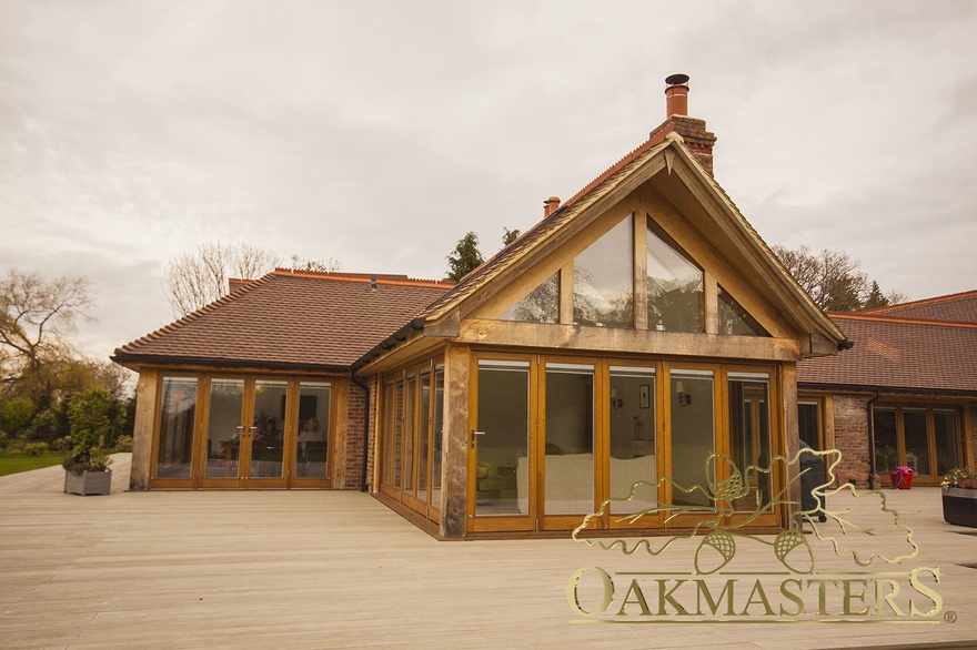 Detail of triple aspect oak glazed gable