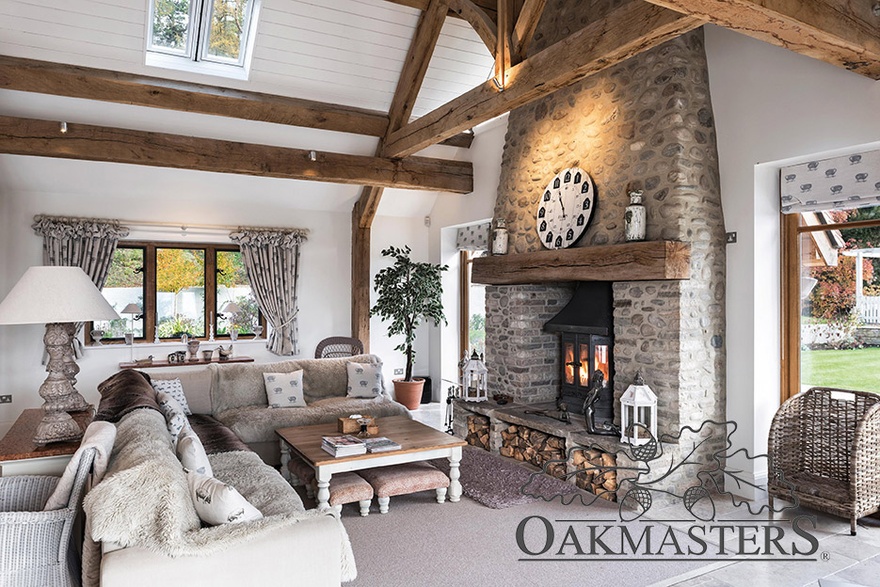 Oak fireplace beam perfectly compliments the high ceilings with oak purlins and trusses